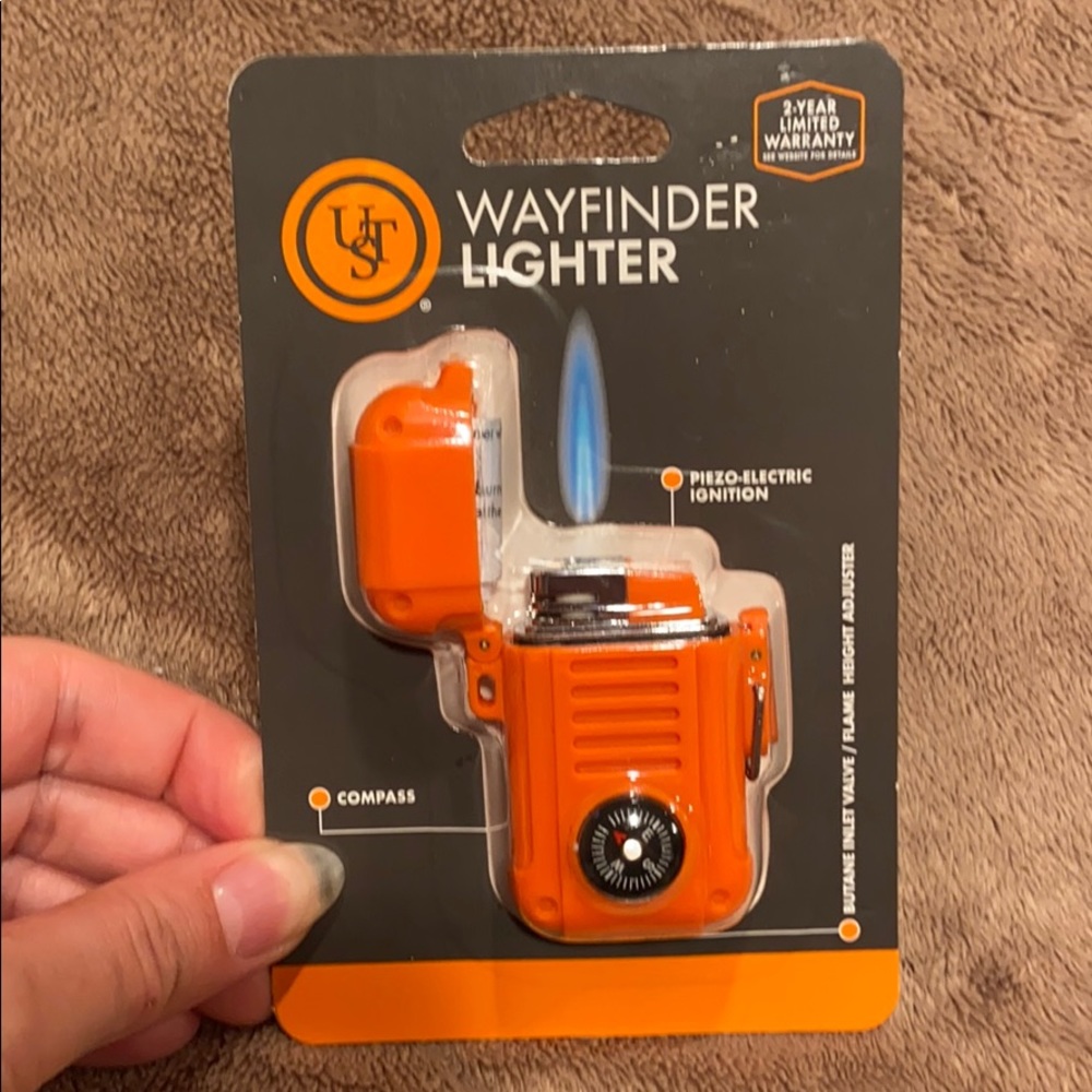 Lighter with compass